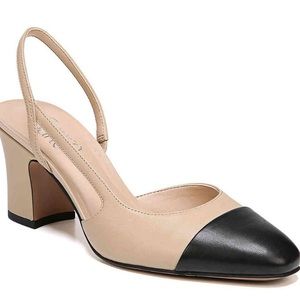 Beige and black cap toe slingback pumps